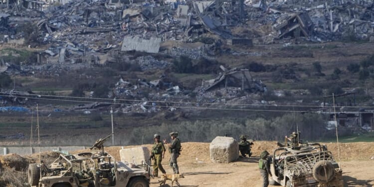 Palestinians stream into Gaza town as Israel expands its offensive in the center