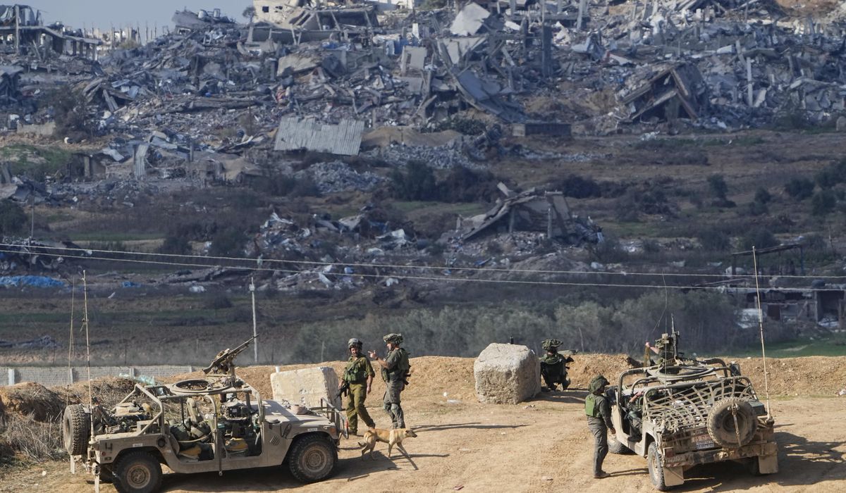 Palestinians stream into Gaza town as Israel expands its offensive in the center