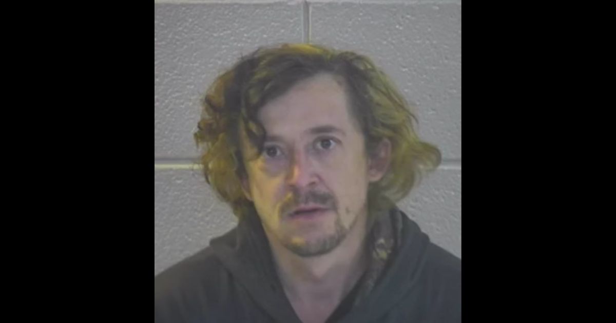 This YouTube screen shot shows the mug shot of Zackary Jones, who stands accused of a number of crimes in both North Carolina and Kentucky.