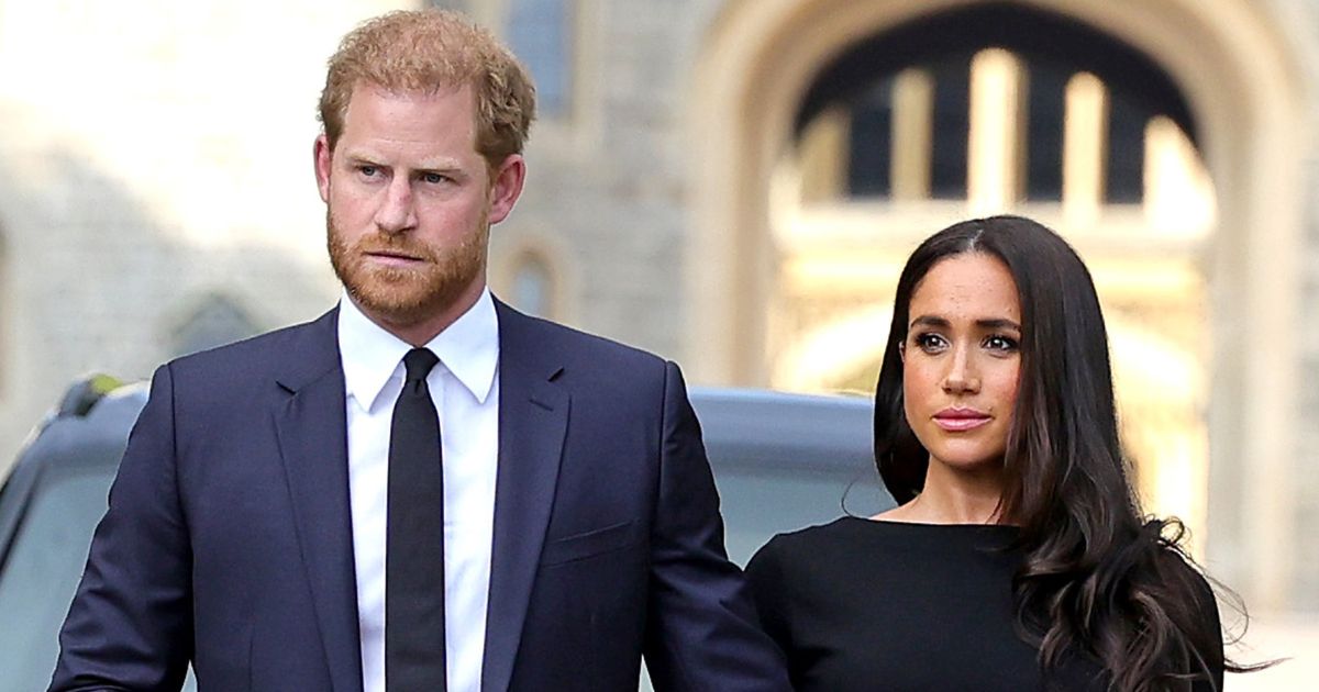 Prince Harry and Meghan arrive to view flowers and tributes to Queen Elizabeth on Sept. 10, 2022.