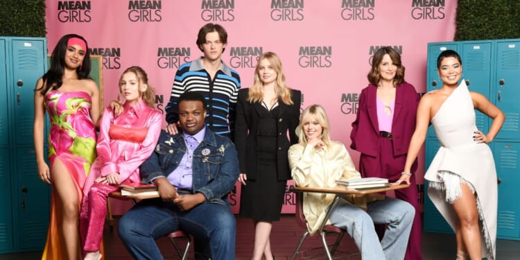 (L-R) Avantika, Bebe Wood, Jaquel Spivey, Christopher Briney, Angourie Rice, Reneé Rapp, Tina Fey, and Auli'i Cravalho attend a "Mean Girls" photocall at the Four Seasons Hotel Los Angeles at Beverly Hills on December 4, 2023, in Los Angeles, California.