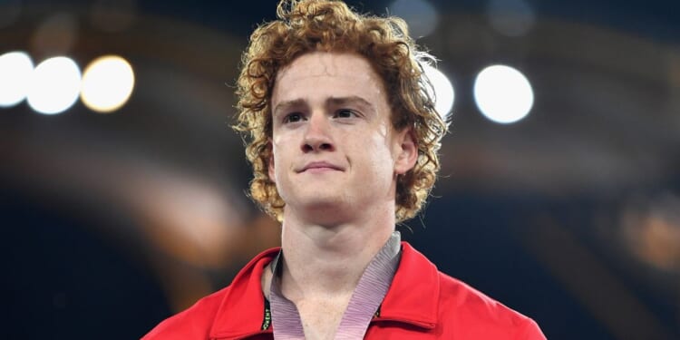 Silver medalist Shawn Barber of Canada looks on during the medal ceremony for the men's pole vault during the Gold Coast Commonwealth Games at Carrara Stadium on the Gold Coast, Australia, on April 12, 2018.