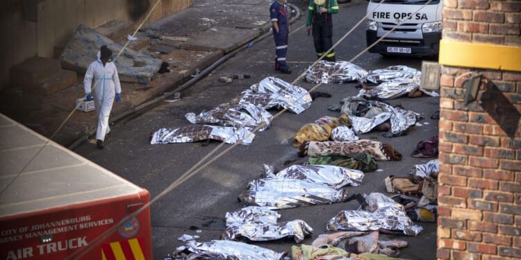 South African police arrest man who says he started a fire that left 76 dead to hide another killing