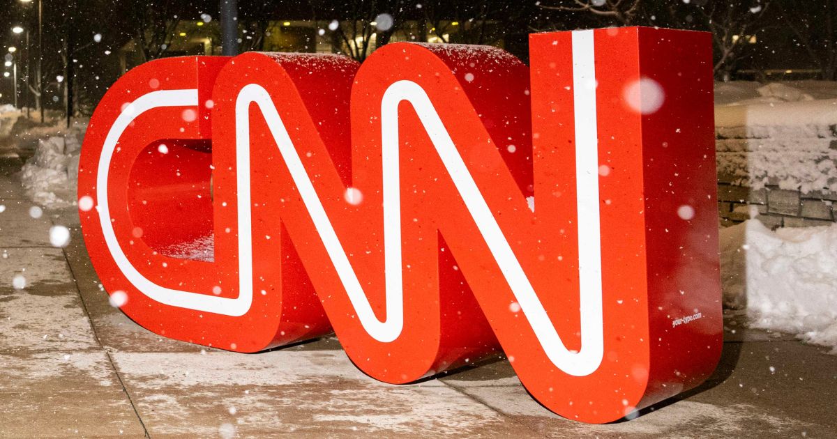 Snow falls on the CNN logo outside the fifth Republican presidential primary debate in Des Moines, Iowa, on Jan. 10.