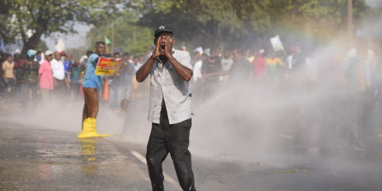 Sri Lanka police use tear gas to disperse opposition protest against dire economic conditions