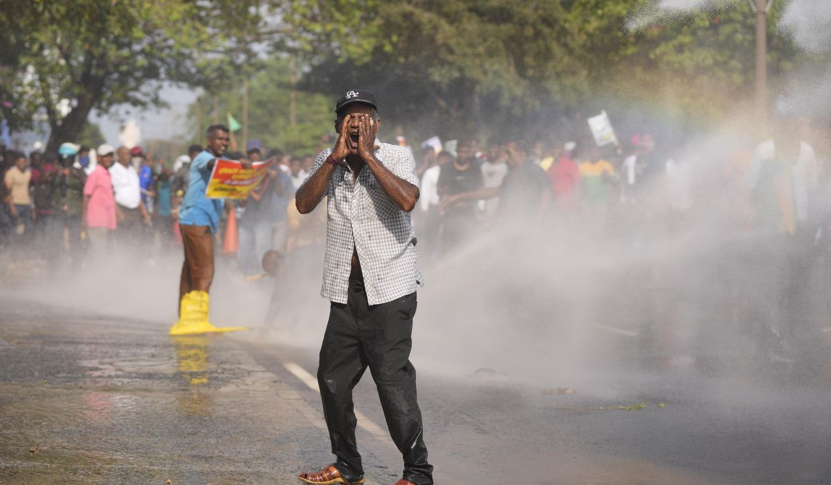 Sri Lanka police use tear gas to disperse opposition protest against dire economic conditions