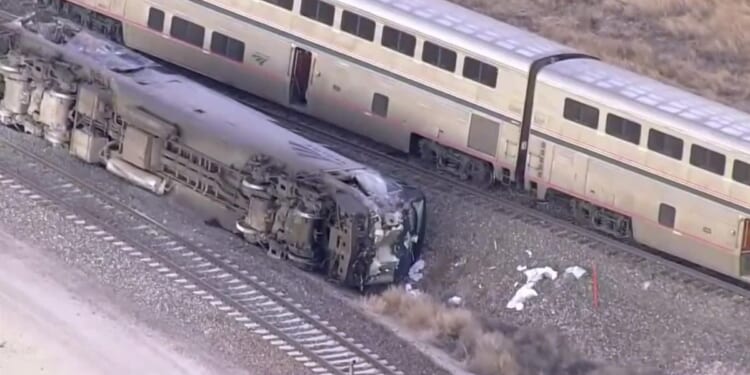 At least 2 people hospitalized after Amtrak train hits milk truck and derails in Colorado