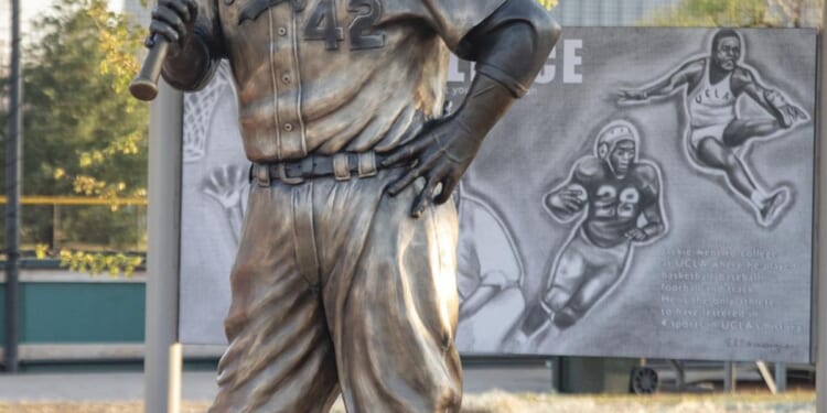 Burned remnants of Jackie Robinson statue found after theft from public park in Kansas