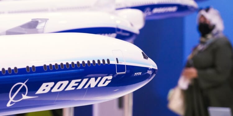 Boeing cuts fourth-quarter loss to $30M, but that was before one of its jets lost a panel in flight