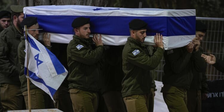 21 Israeli troops are killed in the deadliest attack on the military since the Gaza offensive began