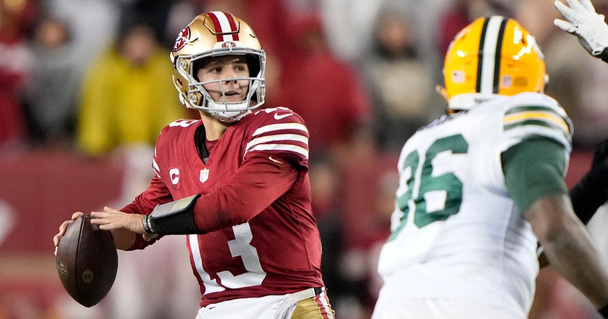 San Francisco 49ers quarterback Brock Purdy looks to pass during the second half against the Green Bay Packers in the NFC Divisional Playoffs in Santa Clara, California, on Saturday.