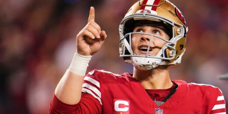 San Francisco 49ers quarterback Brock Purdy celebrates after scoring a touchdown against the Detroit Lions during the second half of the NFC Championship game in Santa Clara, California, on Sunday.