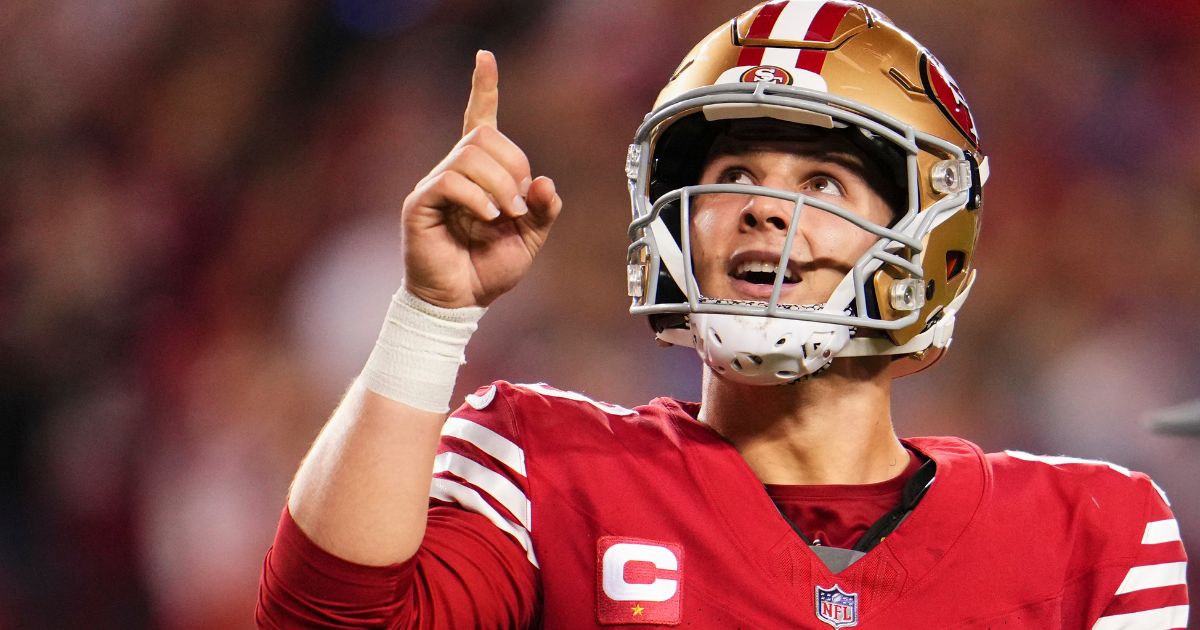 San Francisco 49ers quarterback Brock Purdy celebrates after scoring a touchdown against the Detroit Lions during the second half of the NFC Championship game in Santa Clara, California, on Sunday.