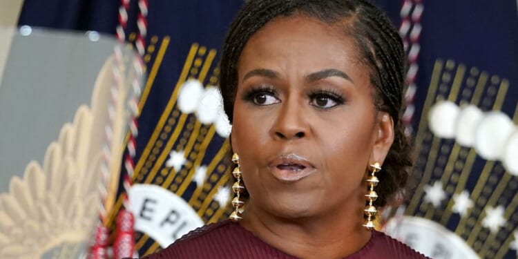 Former first lady Michelle Obama delivers remarks during a ceremony to unveil her official White House portrait in the East Room of the White House in Washington, D.C., on Sept. 7, 2022.