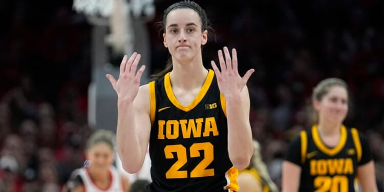 Iowa guard Caitlin Clark gestures in the first half of an NCAA college basketball game against Ohio State, Sunday in Columbus, Ohio.