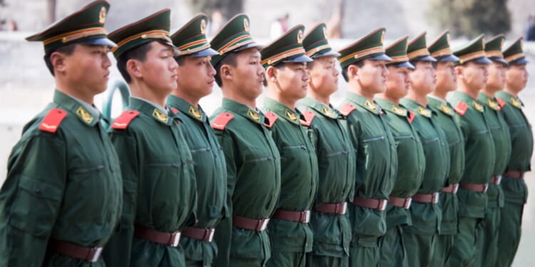 Chinese soldiers are pictured standing stiffly in an undated file photo.