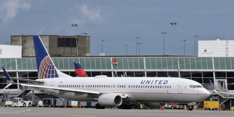 A United Airlines Boeing 737-800 is shown parked at Seattle-Tacoma International Airport on Jan. 26, 2016.