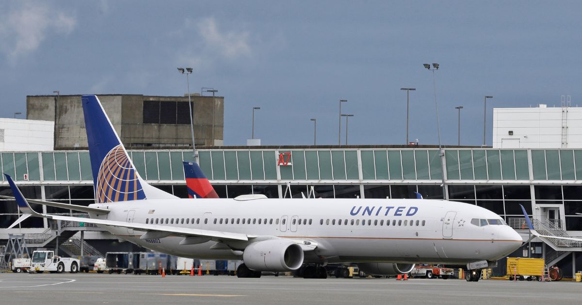 A United Airlines Boeing 737-800 is shown parked at Seattle-Tacoma International Airport on Jan. 26, 2016.