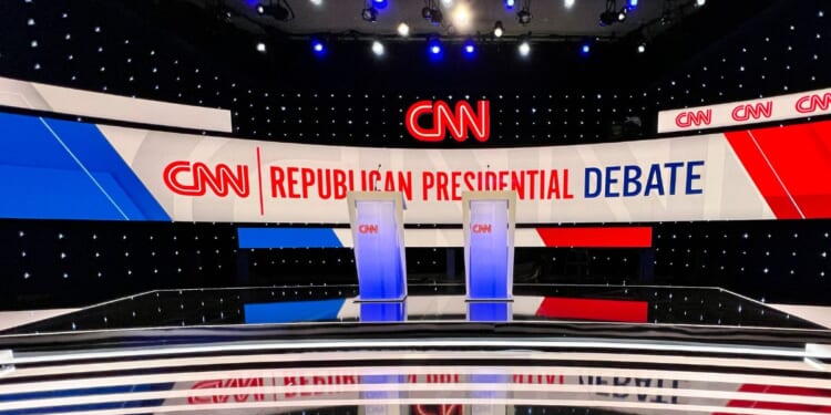 The stage is set prior to the start of the presidential debate hosted by CNN and moderated by journalists Dana Bash and Jake Tapper at Drake University in Des Moines, Iowa, on Jan. 10.