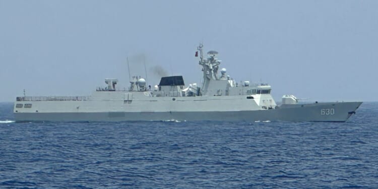 a Chinese Navy warship in the contested waters of the South China sea