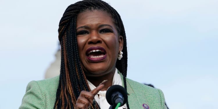 Cori Bush speaking during a news conference