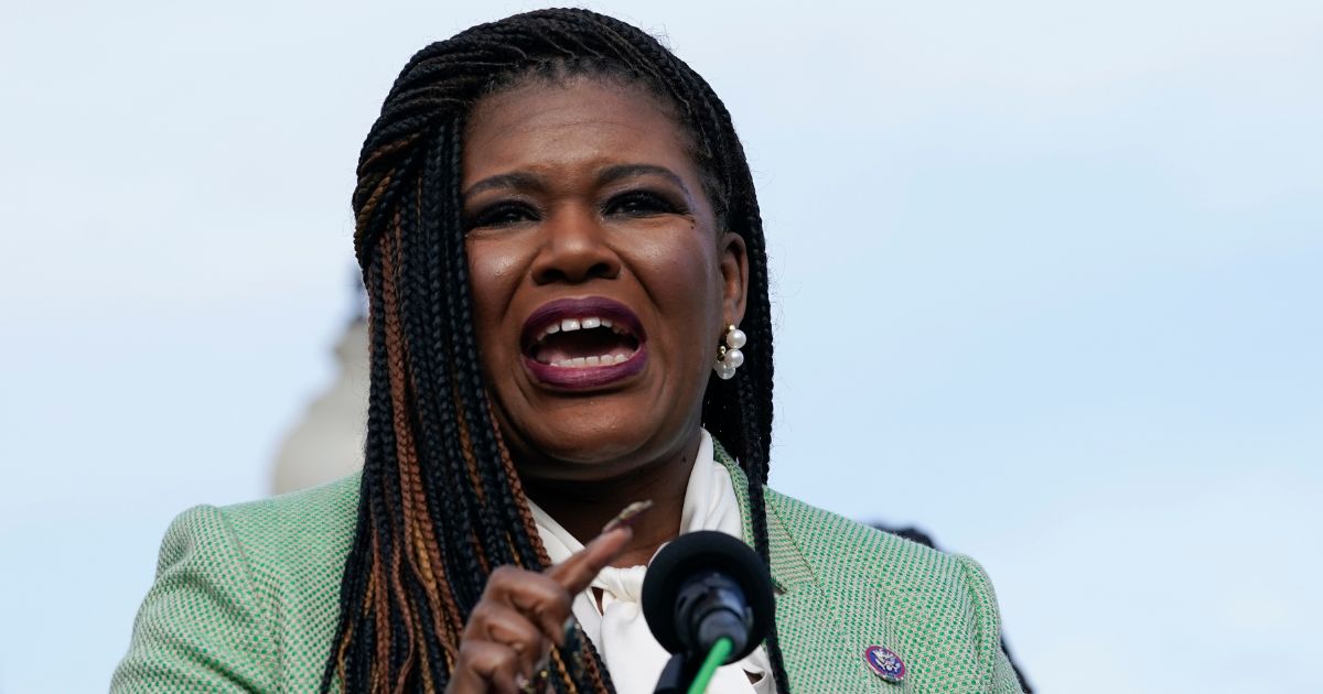 Cori Bush speaking during a news conference