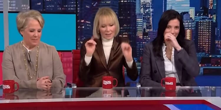 Writer E. Jean Carroll, flanked by attorneys Roberta Kalan, left, and Shawn Crowley, right, being interviewed on MSNBC's "The Rachel Maddow Show."