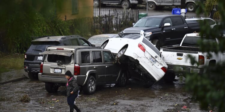 Flash floods inundate homes and overturn cars in San Diego as heavy rains sweep through much of U.S.