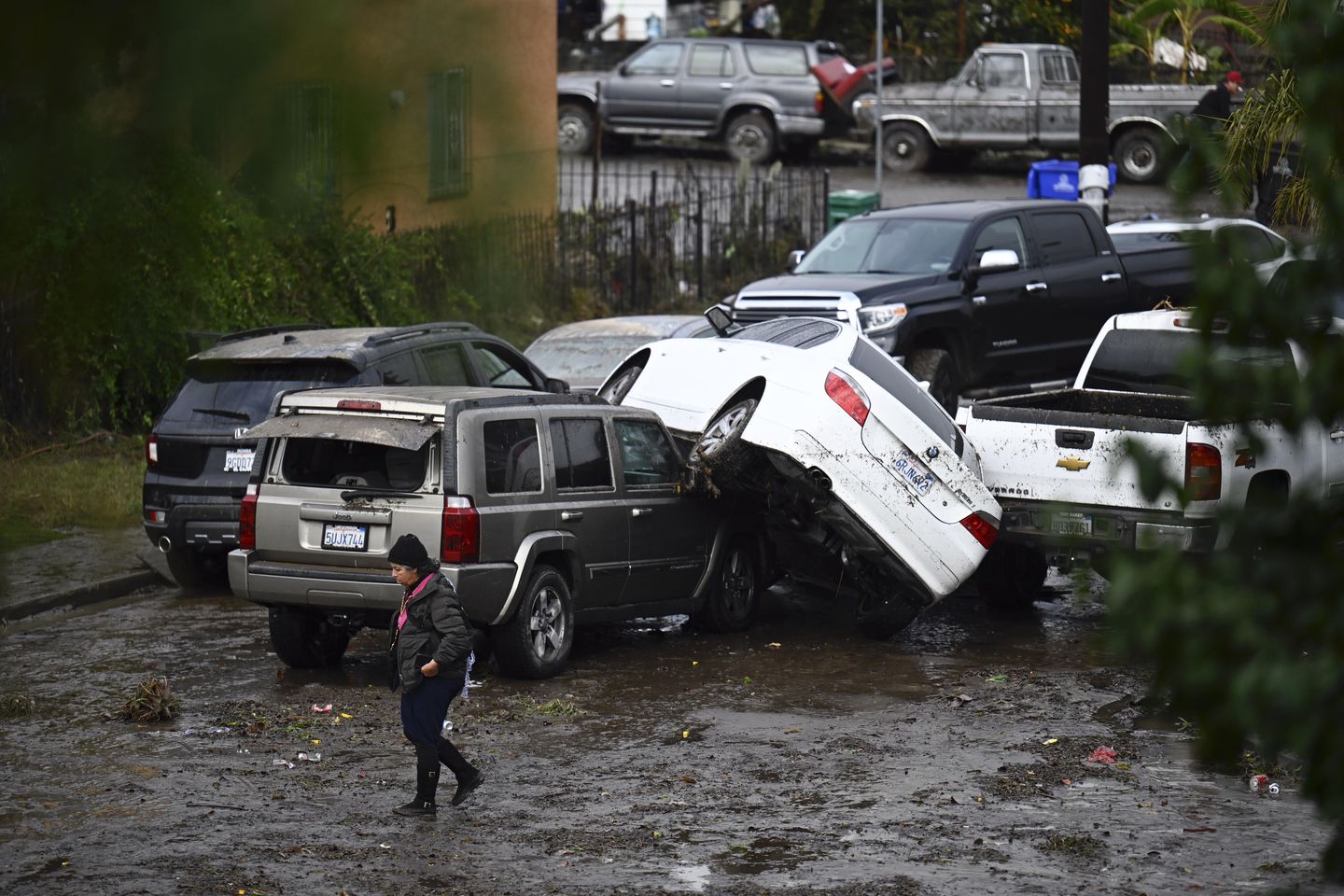 Flash floods inundate homes and overturn cars in San Diego as heavy rains sweep through much of U.S.