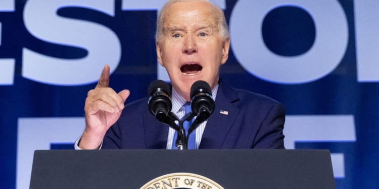 President Joe Biden speaks during a campaign rally in Manassas, Virginia, on Tuesday.