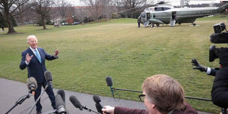 President Joe Biden answers questions on the South Lawn of the White House in Washington before boarding Marine One on Tuesday morning.