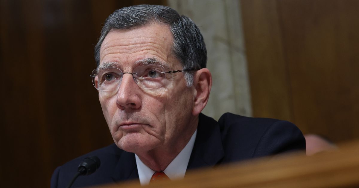 Republican Sen. John Barrasso of Wyoming looks on during a hearing in Washington on May 2.