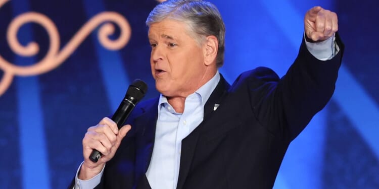 Sean Hannity, seen speaking at a November event, announced he has relocated his family to the "free state of Florida."