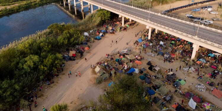 Illegal Immigrants, many from Haiti, are seen at an encampment along the Del Rio International Bridge near the Rio Grande in Del Rio, Texas, on Sept. 21, 2021.