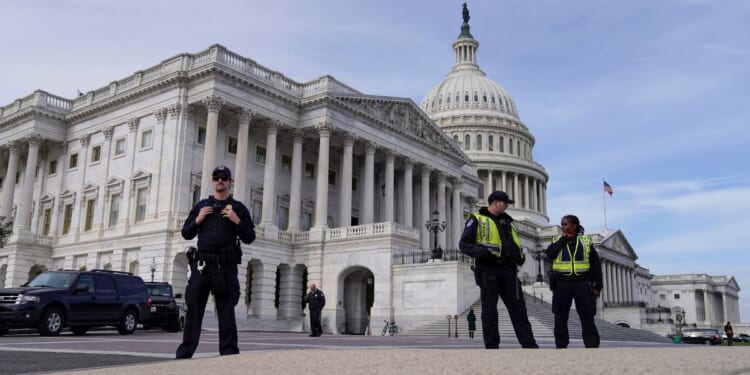 U.S. Capitol Police officers standing guard outside of the Capitol