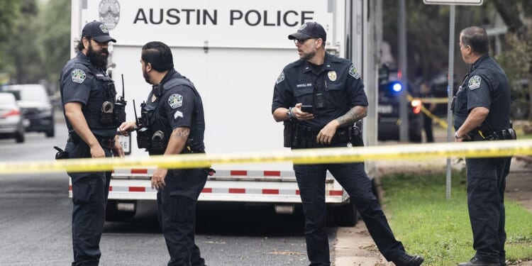 Knife-wielding man shot by Austin police; woman found dead at scene