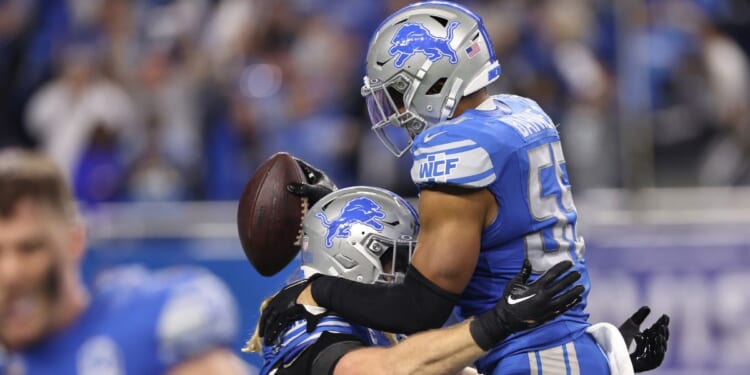 Detroit Lions linebacker Derrick Barnes celebrates after a game-sealing interception against the Tampa Bay Buccaneers in a divisional-round playoff game at Ford Field in Detroit on Sunday.