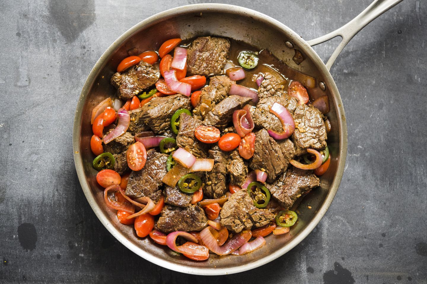 Lomo Saltado: Peruvian beef stir-fry with onions and tomatoes is fusion cooking at its best