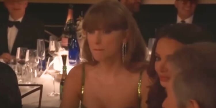 Taylor Swift was unamused after the host made a joke at her expense Sunday during the Golden Globes awards ceremony.