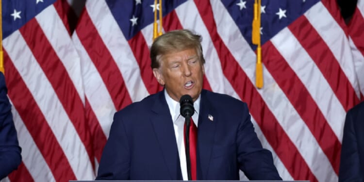 Former President Donald Trump, pictured speaking Monday in Des Moines, Iowa, for the Iowa caucuses.