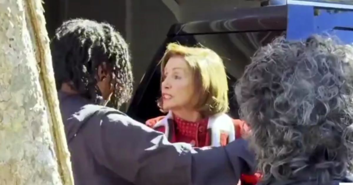 Former Speaker of the House Nancy Pelosi confronted protesters outside her home in San Francisco on Monday, telling them to "go back to China."