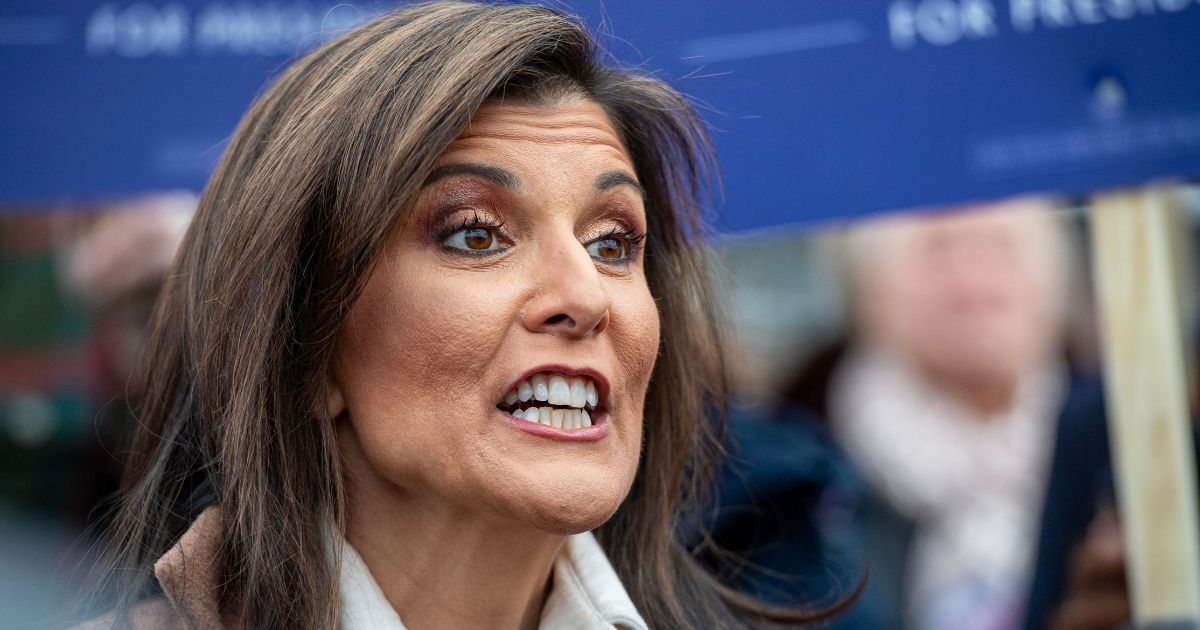 Republican presidential hopeful Nikki Haley speaks to the media during the primary outside a polling site at Winnacunnet High School in Hampton, New Hampshire, on Tuesday.