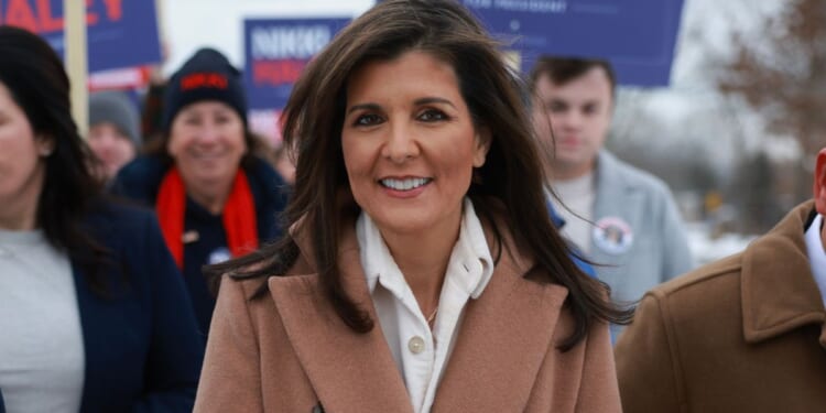 Republican presidential candidate Nikki Haley visits a polling location at Winnacunnet High School to greet voters in Hampton, New Hampshire, on Tuesday.