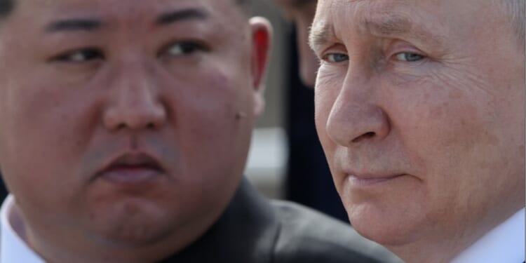 Russian President Vladimir Putin, right, and North Korean leader Kim Jong Un, left, are pictured in a September file photo during a Kim visit to Russia.