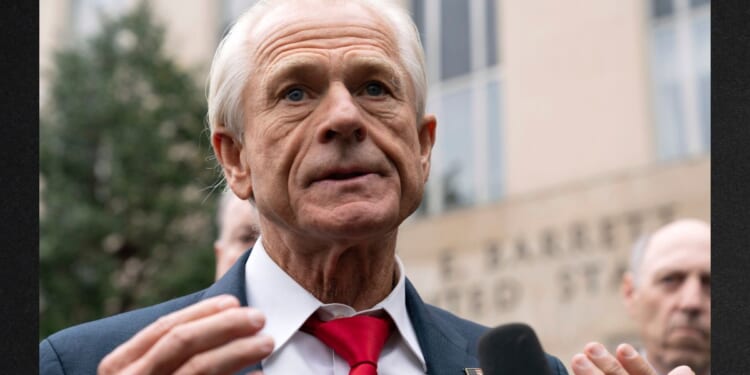 Former Trump White House official Peter Navarro talks to the media as he leaves the U.S. Federal Courthouse in Washington Thursday. Navarro, who was convicted of contempt of Congress for refusing to cooperate with a congressional investigation into the Jan. 6, 2021, Capitol incursion, was sentenced Thursday to four months behind bars.