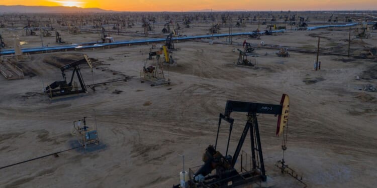 An aerial view shows pumpjacks in the South Belridge Oil Field in McKittrick, California, on April 24, 2020.