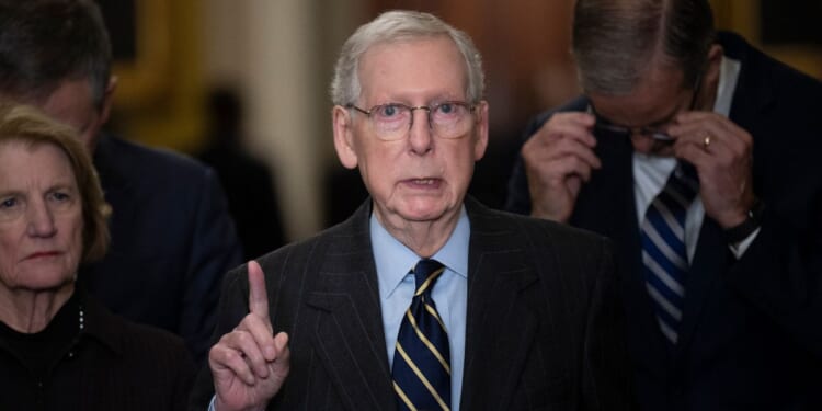 Mitch McConnell speaking during a news conference