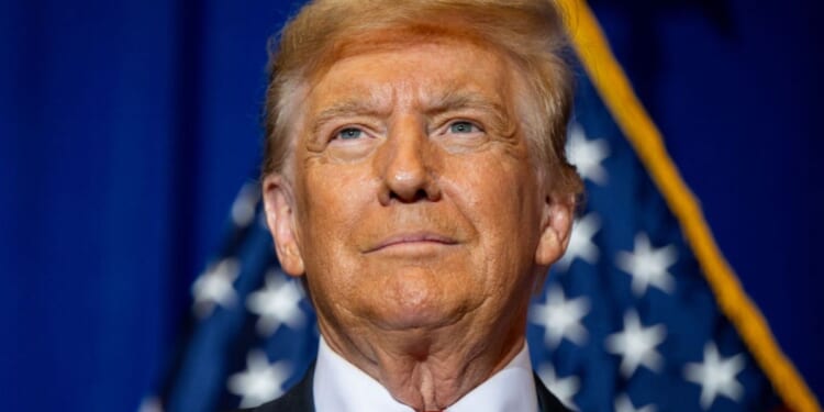 Former President Donald Trump looks on during a campaign rally in Atkinson, New Hampshire, on Tuesday.