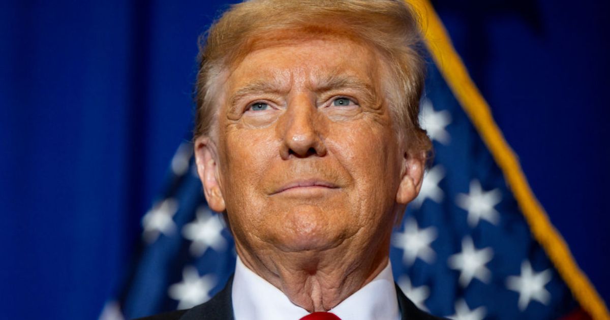 Former President Donald Trump looks on during a campaign rally in Atkinson, New Hampshire, on Tuesday.