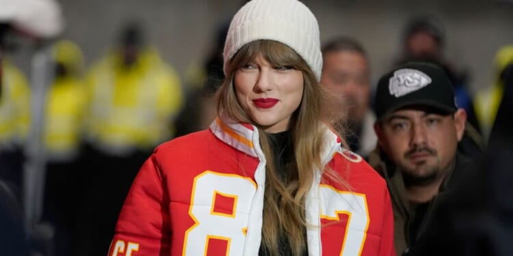 Taylor Swift arrives at an NFL playoff game between the Kansas City Chiefs and the Miami Dolphins, Jan. 13, in Kansas City, Missouri.